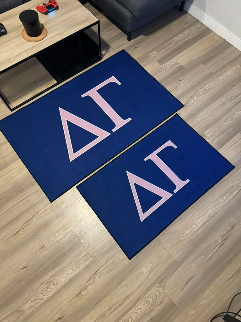 Officially Licensed Delta Gamma Custom Rugs Collection in medium and large in a living room.