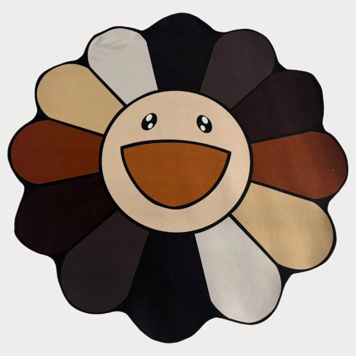 Brown Marukami Flower Rug with warm-toned petals and smiling face, laid flat on a clean background.