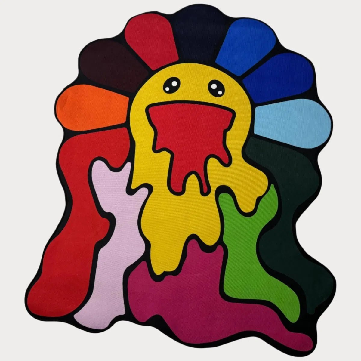Drippy Rainbow Flower Rug featuring colorful smiling petals in pop-art style, laid flat on white.