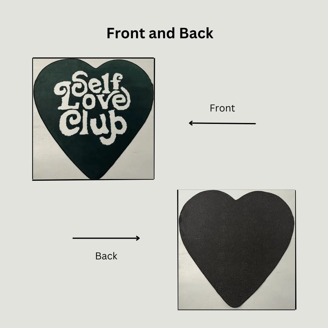 Image showing the printed green heart on the rug's top side and its anti-slip rubber backing.