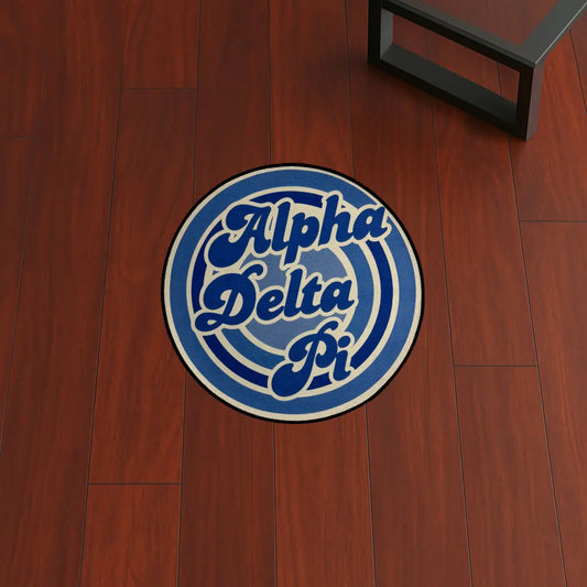 Alpha Delta Pi Retro Look | 2.5x2.5 ft custom rug by Sirenicate Rugs, prominently displayed on a vibrant dark hardwood floor background.