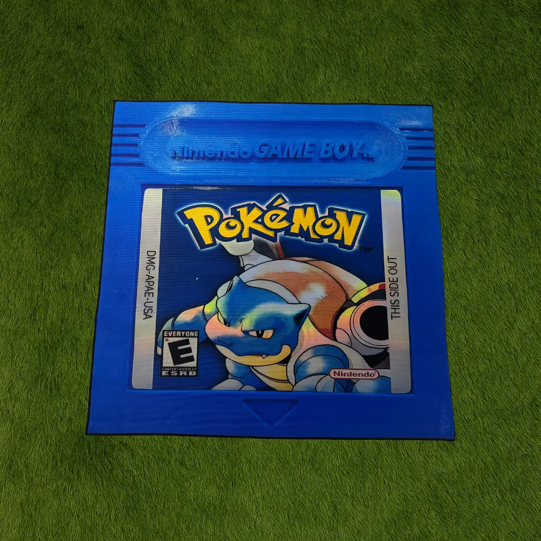 Blastoise Gameboy Rug – Blue Retro Pokémon Custom Rug custom rug by Sirenicate Rugs, prominently displayed on a vibrant dark green turf background.