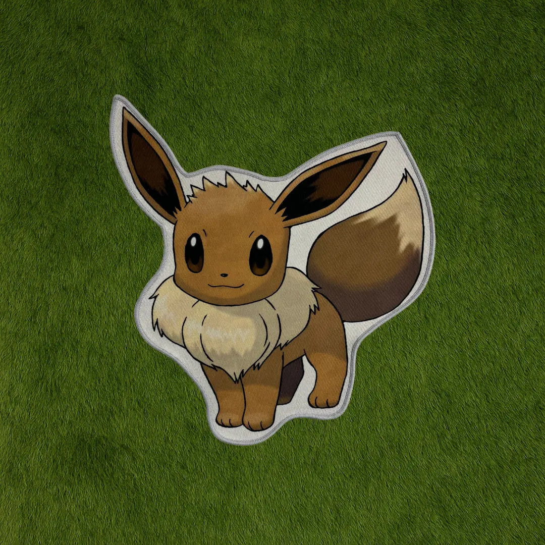 Custom Eevee Rug – Soft & Plush for Pokémon Fans custom rug by Sirenicate Rugs, prominently displayed on a vibrant dark green turf background.