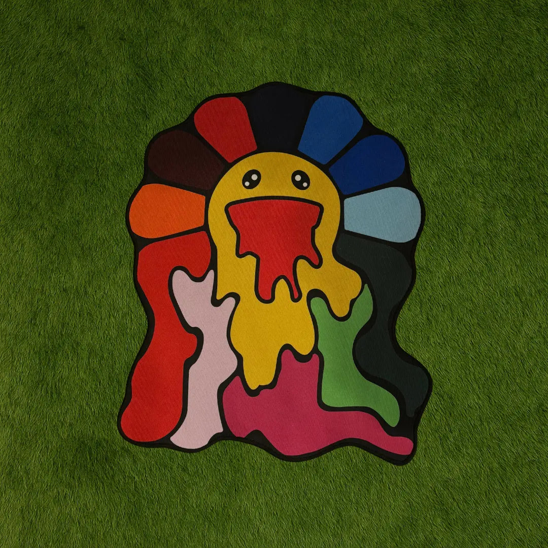 Custom Rug – Drippy Rainbow Flower Design custom rug by Sirenicate Rugs, prominently displayed on a vibrant dark green turf background.
