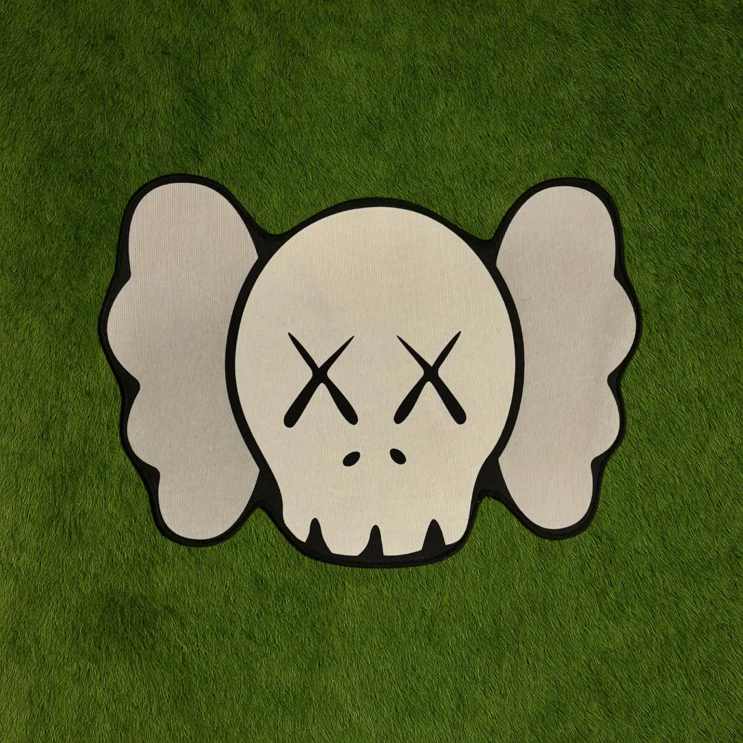 Custom Rug – KAWS Head Grey Tone Edition custom rug by Sirenicate Rugs, prominently displayed on a vibrant dark green turf background.
