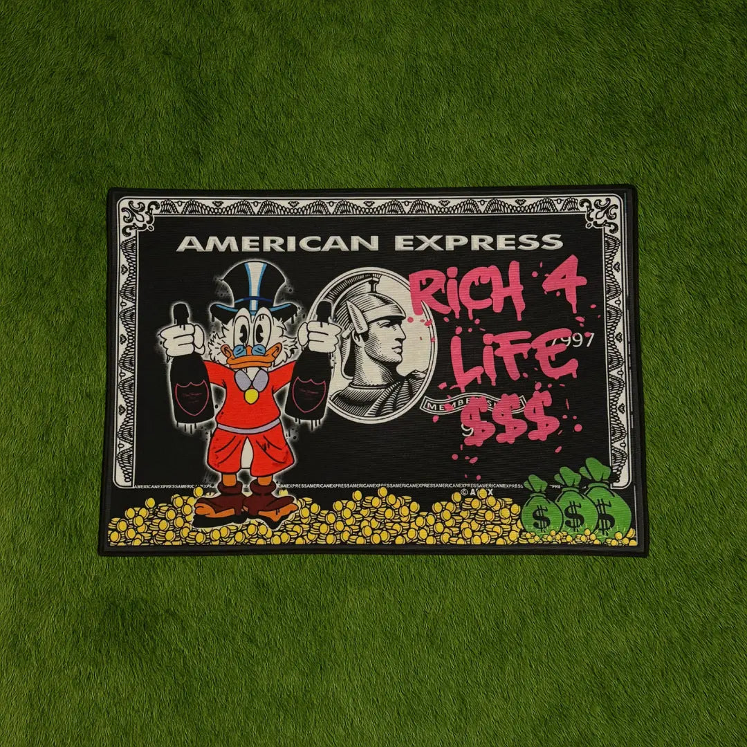 Custom Rug – Rich 4 Life Amex Edition Doormat | 2.5x1.5 ft custom rug by Sirenicate Rugs, prominently displayed on a vibrant dark green turf background.