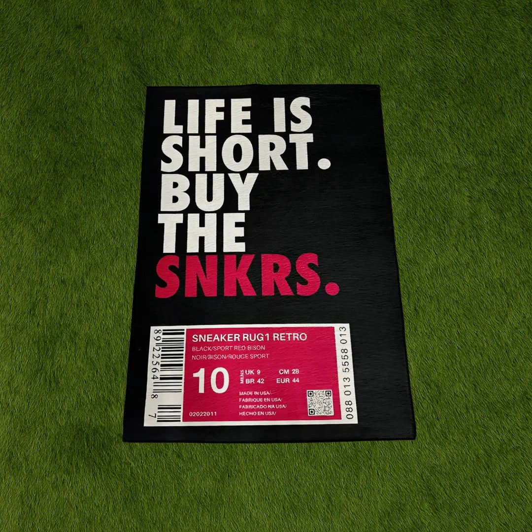 Custom Rug – Sneaker Box Hype Pink Edition custom rug by Sirenicate Rugs, prominently displayed on a vibrant dark green turf background.