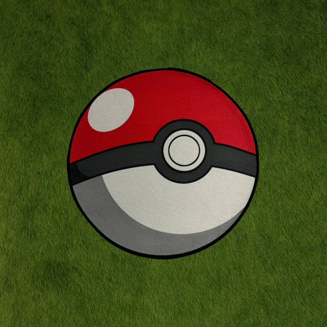 Pokéball Rug – Original Design for Fans custom rug by Sirenicate Rugs, prominently displayed on a vibrant dark green turf background.