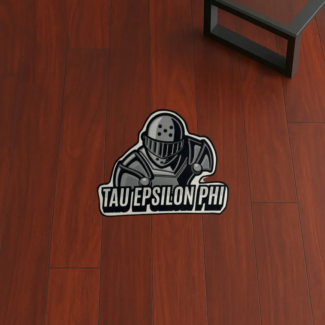 Custom Rug – Tau Epsilon Phi Knight Design custom rug by Sirenicate Rugs, prominently displayed on a vibrant dark hardwood floor background.