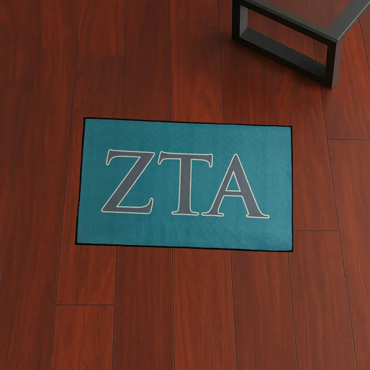 ZETA Sorority Letters Decor | 3x2 ft Custom Rug by Sirenicate Rugs, prominently displayed on a vibrant dark hardwood floor background.