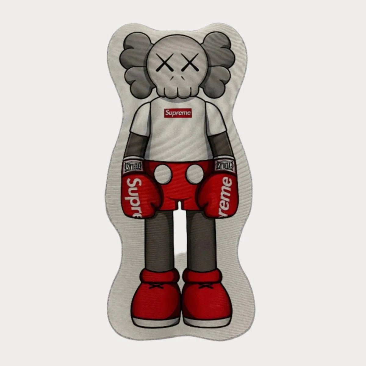 Supreme X KAWS Rug featuring boxing glove design and KAWS figure on a white background.