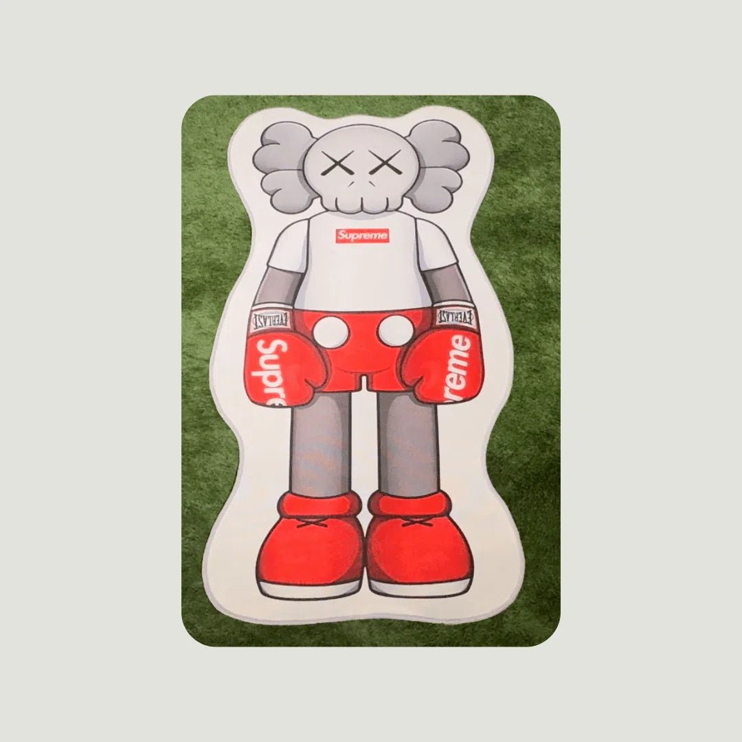 Supreme X KAWS Rugs laid on turf, styled with streetwear sneakers to show design, size, and vibe.