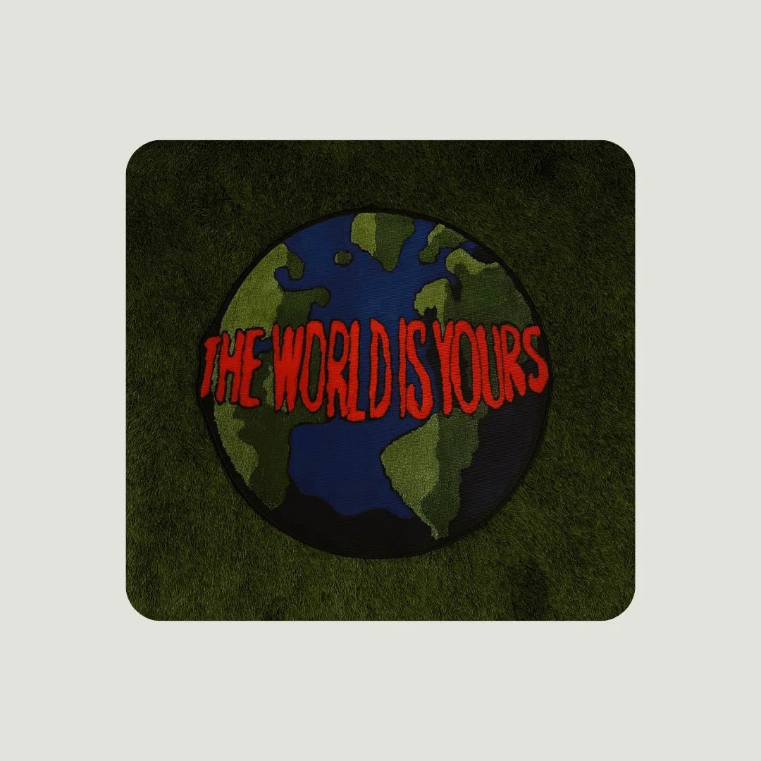 The World Is Yours Rugs styled on turf showing contrast, clarity, and bold visual impact.