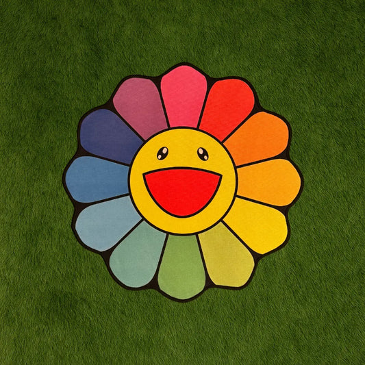 Custom Rug – Rainbow Marukami Flower Design custom rug by Sirenicate Rugs, prominently displayed on a vibrant dark green turf background.